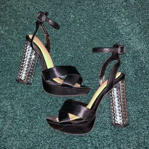 Black platform heels with silver crystal heel
